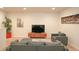 Relaxing living room with sectional sofa and large TV at 2022 Majorca Dr, Kissimmee, FL 34747