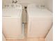 Stackable Whirlpool washer and dryer in the laundry room at 2022 Majorca Dr, Kissimmee, FL 34747