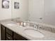 Elegant bathroom with double vanity and granite countertop at 2022 Majorca Dr, Kissimmee, FL 34747