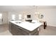 Modern kitchen with stainless steel appliances and an island at 121 Kenny Blvd, Haines City, FL 33844
