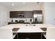 Modern kitchen with stainless steel appliances and an island at 121 Kenny Blvd, Haines City, FL 33844