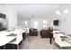 Open concept kitchen and living room with modern design at 121 Kenny Blvd, Haines City, FL 33844