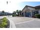 Community clubhouse with inviting entrance and landscaping at 121 Kenny Blvd, Haines City, FL 33844