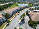 Aerial view of townhouses and neighborhood street at 121 Kenny Blvd, Haines City, FL 33844
