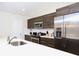 Modern kitchen with stainless steel appliances and an island at 121 Kenny Blvd, Haines City, FL 33844