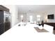 Modern kitchen with stainless steel appliances and an island at 121 Kenny Blvd, Haines City, FL 33844