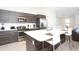 Modern kitchen with stainless steel appliances and an island at 121 Kenny Blvd, Haines City, FL 33844