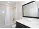 Clean bathroom with white tub and modern vanity at 121 Kenny Blvd, Haines City, FL 33844