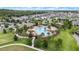 Aerial view of community pool with waterslide and surrounding amenities at 3241 Wauseon Dr, St Cloud, FL 34772