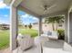 Relaxing covered patio overlooking the water at 3241 Wauseon Dr, St Cloud, FL 34772