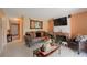 Living room featuring fireplace and comfortable seating at 5038 Downing St # 7, Orlando, FL 32839
