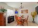 Cozy dining area featuring a wood table and chairs at 5038 Downing St # 7, Orlando, FL 32839