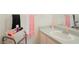 Clean bathroom with sink, vanity, and towels at 5038 Downing St # 7, Orlando, FL 32839