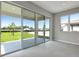 Dining area with sliding glass doors leading to a patio and backyard at 155 Bull Frog Ln, Umatilla, FL 32784