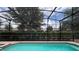 Screened-in pool with backyard view at 2131 Tripoli Ct, Kissimmee, FL 34747