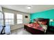 Bright bedroom with a king-size bed and large windows at 2131 Tripoli Ct, Kissimmee, FL 34747
