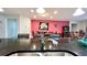 Kitchen with granite countertop and sink overlooking dining area at 2131 Tripoli Ct, Kissimmee, FL 34747