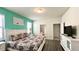 Main bedroom with king-size bed, en-suite bathroom at 2131 Tripoli Ct, Kissimmee, FL 34747