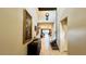 Two-story entryway with a staircase and view into living areas at 2131 Tripoli Ct, Kissimmee, FL 34747