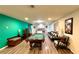 Game room with pool table and teal accent wall at 2131 Tripoli Ct, Kissimmee, FL 34747