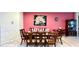 Formal dining room with a large wood table and chairs at 2131 Tripoli Ct, Kissimmee, FL 34747
