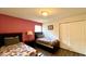 Bedroom with two twin beds and pink wall at 2131 Tripoli Ct, Kissimmee, FL 34747