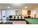 Game room with pool table and seating area at 2131 Tripoli Ct, Kissimmee, FL 34747