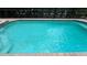 Enjoy this refreshing pool with brick coping at 2131 Tripoli Ct, Kissimmee, FL 34747