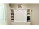 White built-in bench with cubbies perfect for storage at 2131 Tripoli Ct, Kissimmee, FL 34747