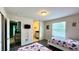 Bedroom with two twin beds and a view of kitchen at 2131 Tripoli Ct, Kissimmee, FL 34747