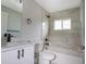 Modern bathroom with bathtub and quartz vanity at 16617 Sw 31St Cir, Ocala, FL 34473