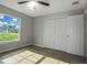 Bright bedroom with large window and closet at 16617 Sw 31St Cir, Ocala, FL 34473