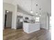 Modern kitchen with stainless steel appliances and an island at 16617 Sw 31St Cir, Ocala, FL 34473