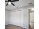 Bedroom with double door closet and ceiling fan at 16617 Sw 31St Cir, Ocala, FL 34473