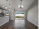 Spacious dining area with sliding glass doors leading to the backyard at 16619 Sw 31St Cir, Ocala, FL 34473