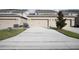 Shared driveway leading to the garage at 13712 Summerport Village Pkwy, Windermere, FL 34786