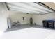 Attached garage with space for a bike and storage at 13712 Summerport Village Pkwy, Windermere, FL 34786