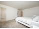 Bright bedroom with a comfortable bed and en-suite bathroom access at 13712 Summerport Village Pkwy, Windermere, FL 34786