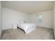 Spacious bedroom with window and ample floor space at 13712 Summerport Village Pkwy, Windermere, FL 34786