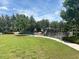 Community playground with playset and grassy area at 13712 Summerport Village Pkwy, Windermere, FL 34786