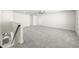 Spacious bonus room with grey carpet and ceiling fan at 3999 Meandering Bay Dr, Apopka, FL 32712