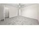 Bedroom with gray carpet and ceiling fan at 3999 Meandering Bay Dr, Apopka, FL 32712
