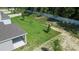 Large backyard with a grassy area and privacy fence at 3999 Meandering Bay Dr, Apopka, FL 32712