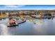 Community lake with a gazebo and walking path, offering scenic views at 668 Cordoba Dr, Davenport, FL 33837