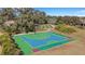 Aerial view of community amenities including a basketball court and shuffleboard at 668 Cordoba Dr, Davenport, FL 33837