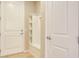 Bright entryway with built-in bench, shelving and coat rack at 668 Cordoba Dr, Davenport, FL 33837