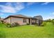 House with fenced backyard and lawn at 668 Cordoba Dr, Davenport, FL 33837