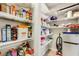 Well-organized pantry with wire shelving, perfect for storing groceries at 668 Cordoba Dr, Davenport, FL 33837
