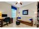 Relaxing home office with a daybed, workspace and window at 668 Cordoba Dr, Davenport, FL 33837