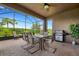 Screened patio with seating area and built in grill at 668 Cordoba Dr, Davenport, FL 33837